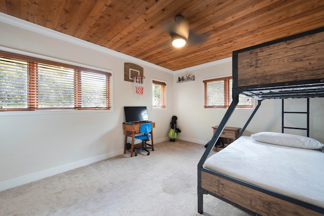 carpeted bedroom with crown molding and wood ceiling