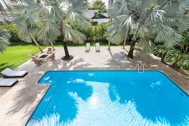 view of swimming pool featuring a patio