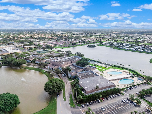 bird's eye view with a water view