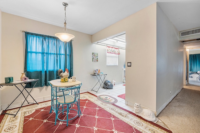 view of carpeted dining space