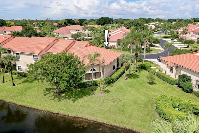 bird's eye view with a water view