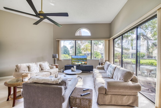 living room with a healthy amount of sunlight and light wood-type flooring