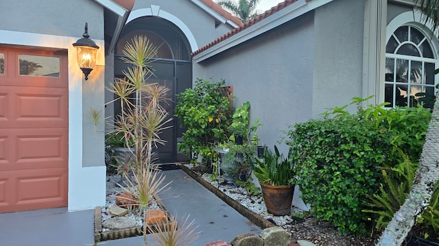 entrance to property with a garage