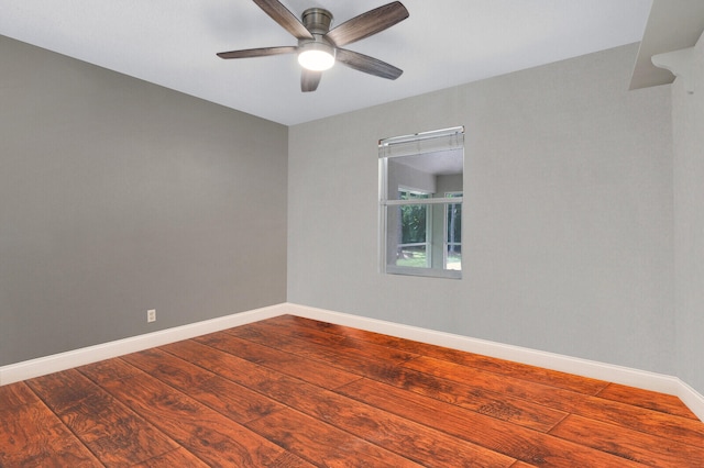 empty room with hardwood / wood-style flooring and ceiling fan