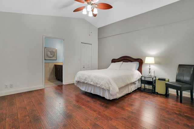 bedroom featuring ceiling fan, a closet, ensuite bath, vaulted ceiling, and dark hardwood / wood-style flooring