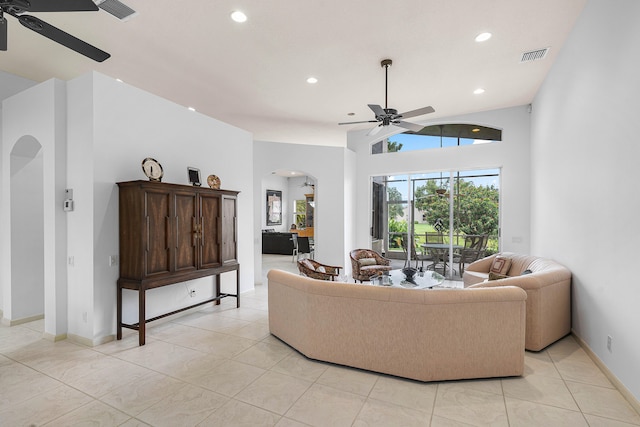 living room featuring ceiling fan and light tile patterned floors