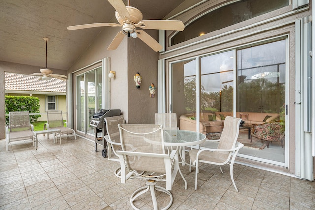 sunroom / solarium with lofted ceiling