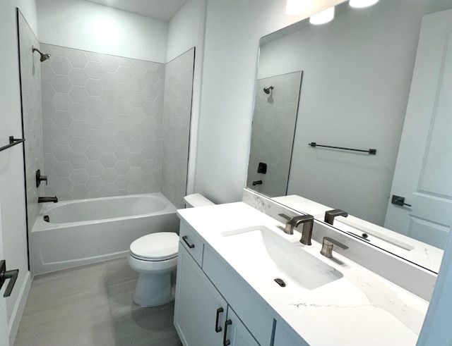 bathroom with vanity, toilet, and washtub / shower combination