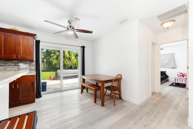 dining area featuring light hardwood / wood-style flooring and ceiling fan