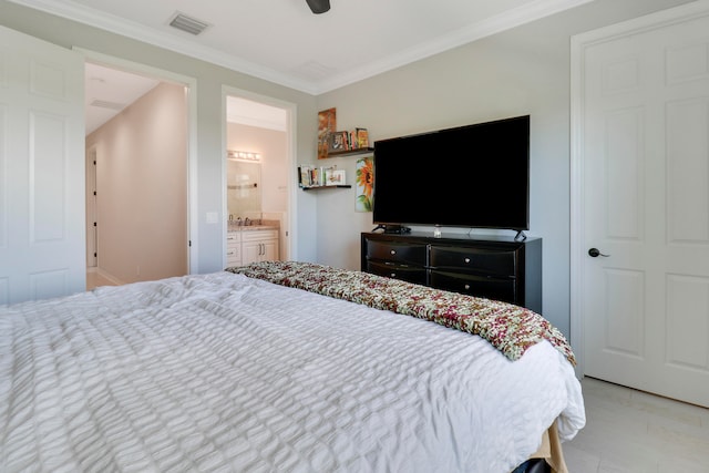 bedroom featuring ceiling fan, connected bathroom, and crown molding