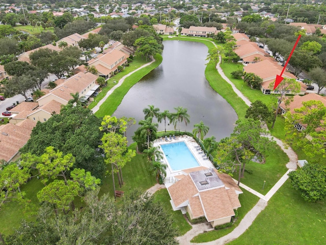 drone / aerial view with a water view