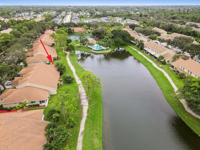 bird's eye view with a water view