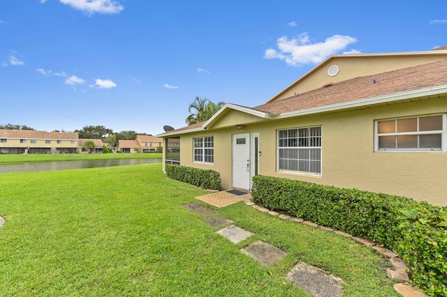 view of front of house with a front lawn