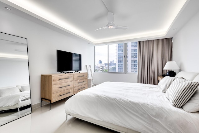 1000 W Ave Unit 502, Miami Beach, FL 33139 - bedroom with a ceiling fan, a raised ceiling, and recessed lighting
