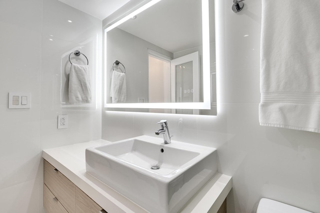 1000 W Ave Unit 502, Miami Beach, FL 33139 - bathroom with vanity and toilet