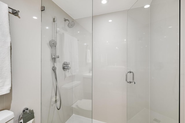 1000 W Ave Unit 502, Miami Beach, FL 33139 - full bathroom with a stall shower and recessed lighting