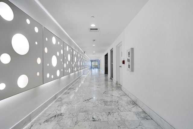1000 W Ave Unit 502, Miami Beach, FL 33139 - hallway with marble finish floors and baseboards