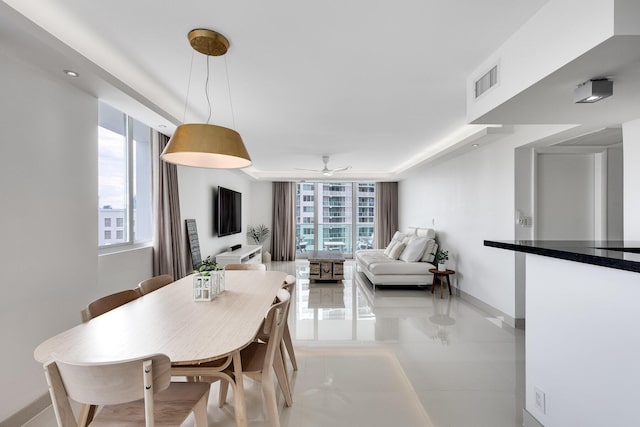 1000 W Ave Unit 502, Miami Beach, FL 33139 - dining room with ceiling fan and light tile patterned flooring