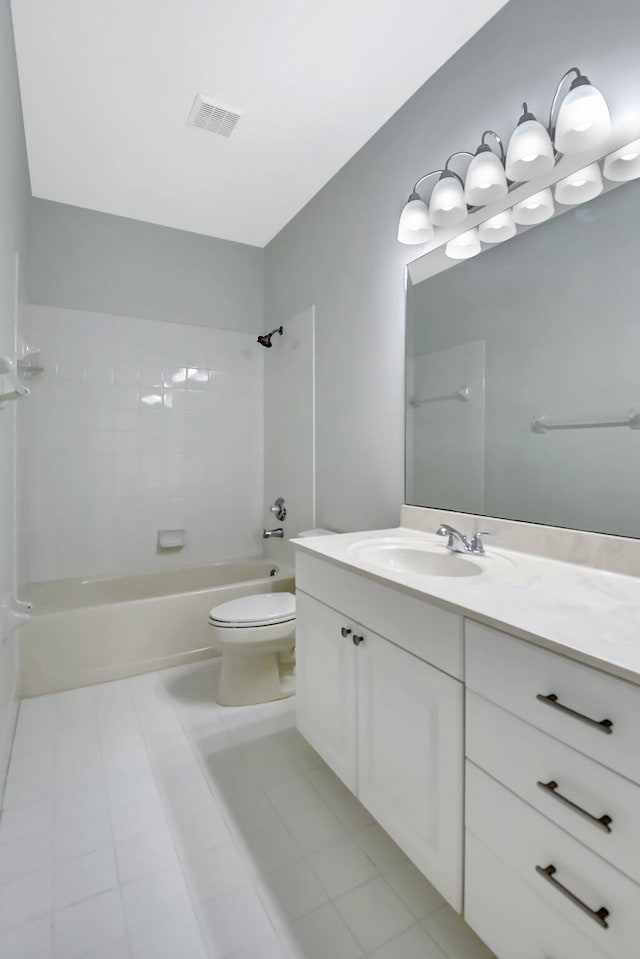 full bathroom with tile patterned flooring, shower / washtub combination, vanity, and toilet