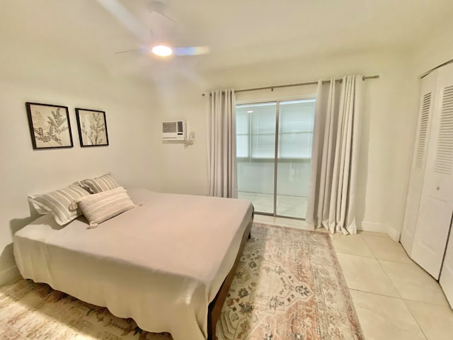 tiled bedroom with ceiling fan and access to outside