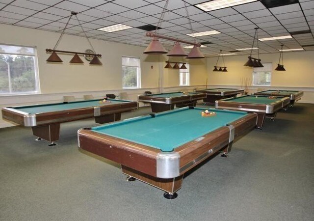 game room featuring a drop ceiling and carpet