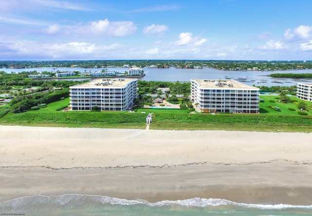 aerial view with a view of the beach and a water view