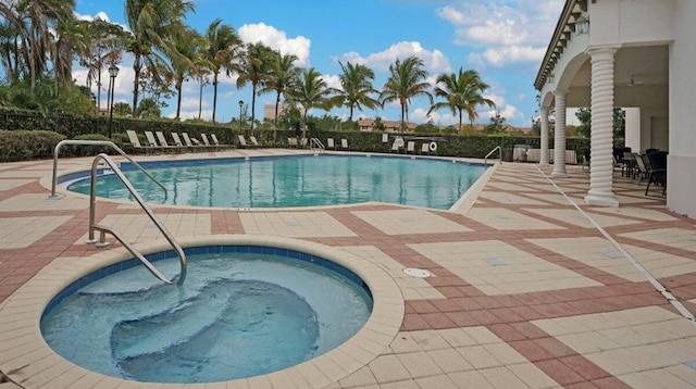 view of swimming pool featuring a patio