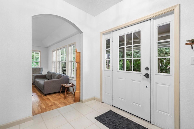 foyer entrance with light wood-type flooring