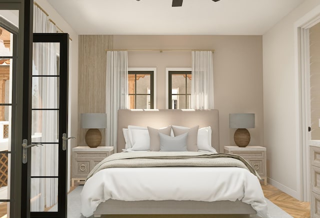 bedroom featuring a baseboard heating unit, baseboards, and ceiling fan