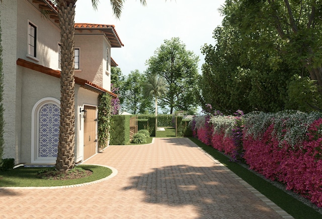 exterior space with a garage and fence