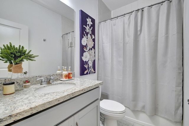 bathroom featuring toilet, shower / tub combo with curtain, and vanity