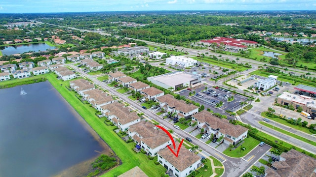 drone / aerial view with a water view