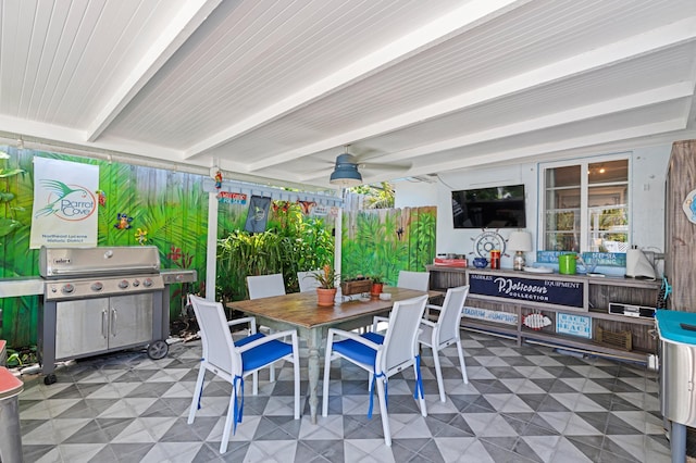 view of patio featuring ceiling fan