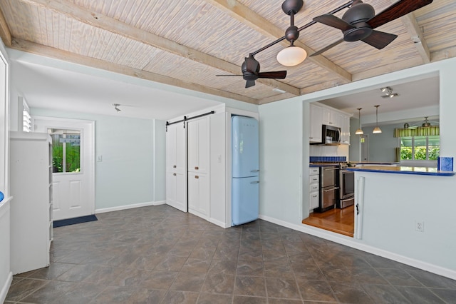 430 N Ocean Breeze, Lake Worth Beach, FL 33460 - unfurnished living room featuring plenty of natural light, a barn door, ceiling fan, and a wood ceiling with exposed beams