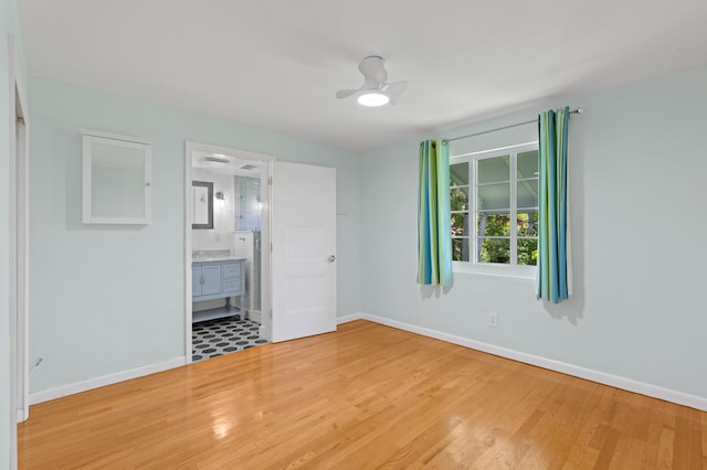 430 N Ocean Breeze, Lake Worth Beach, FL 33460 - unfurnished bedroom with light wood-type flooring and ensuite bathroom