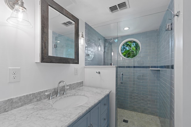 430 N Ocean Breeze, Lake Worth Beach, FL 33460 - bathroom featuring vanity and a stall shower