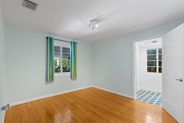 430 N Ocean Breeze, Lake Worth Beach, FL 33460 - unfurnished room featuring wood finished floors