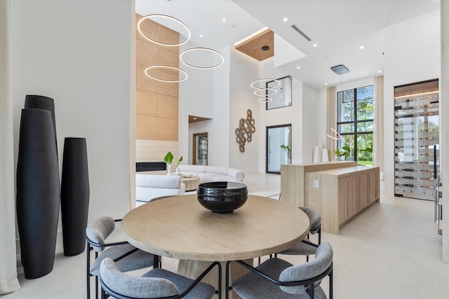 dining space with a high ceiling