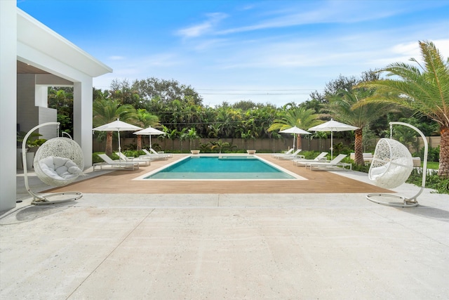 view of pool featuring a patio