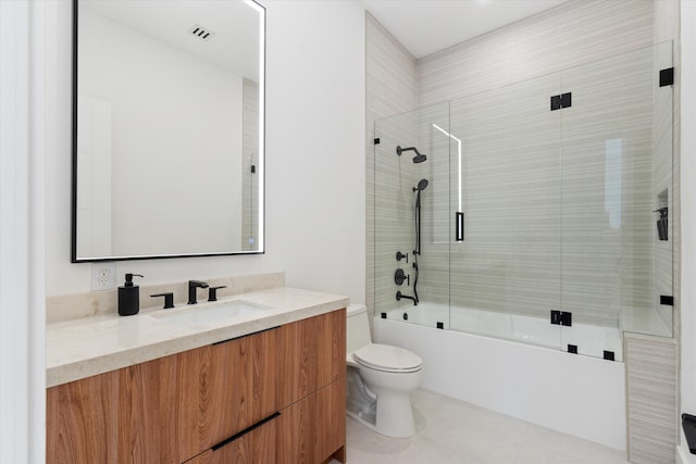 full bathroom with toilet, combined bath / shower with glass door, and vanity