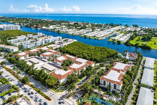 birds eye view of property featuring a water view