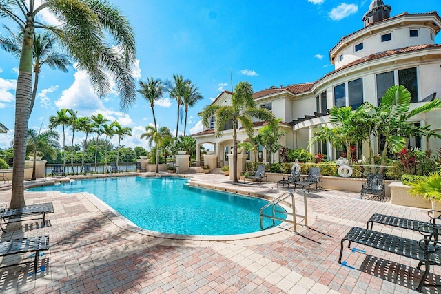 view of pool featuring a patio