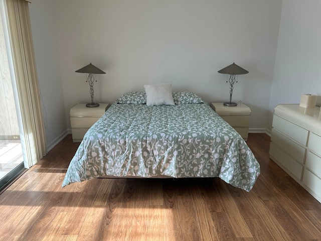 bedroom featuring wood-type flooring