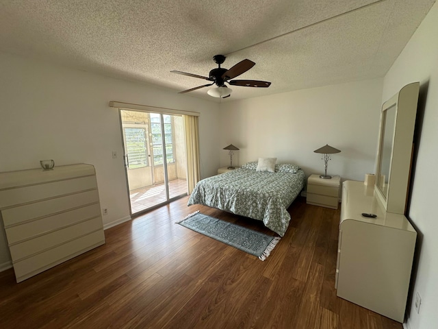 bedroom with a textured ceiling, access to exterior, ceiling fan, and dark hardwood / wood-style flooring