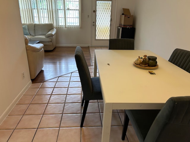 dining room with light hardwood / wood-style flooring