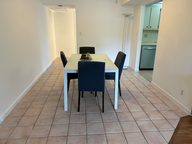 dining room featuring light tile patterned floors