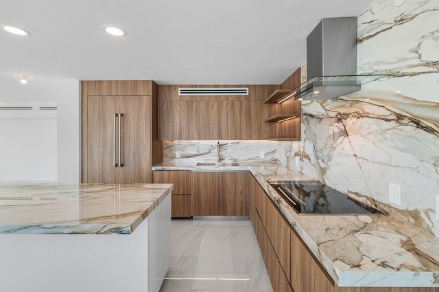 kitchen with sink, paneled built in refrigerator, backsplash, range hood, and black electric stovetop