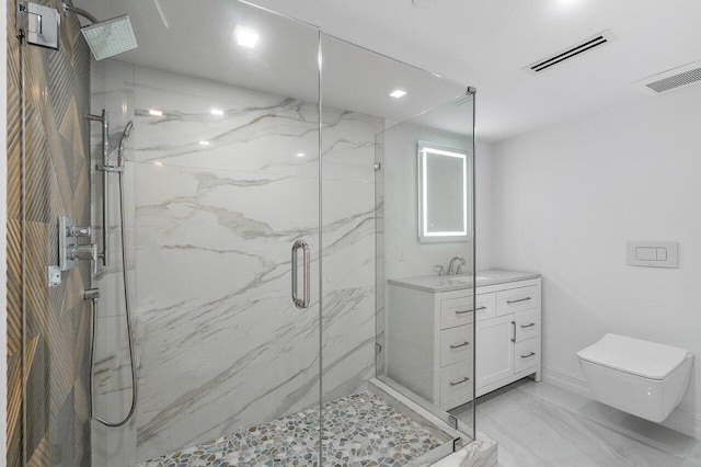 bathroom with vanity, toilet, and an enclosed shower