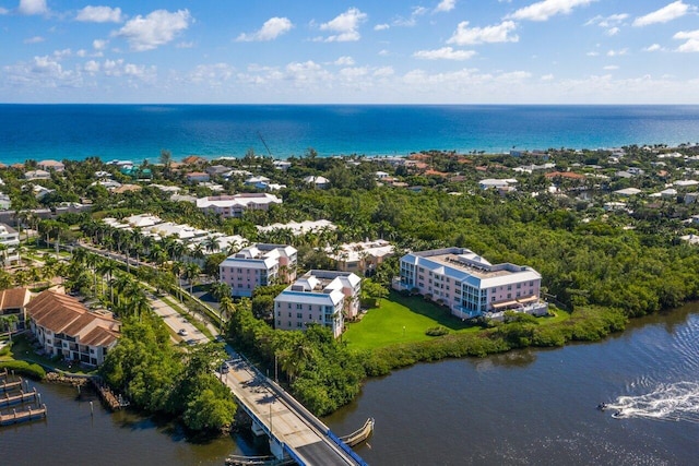 drone / aerial view with a water view