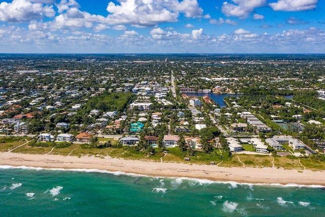 bird's eye view with a view of the beach and a water view